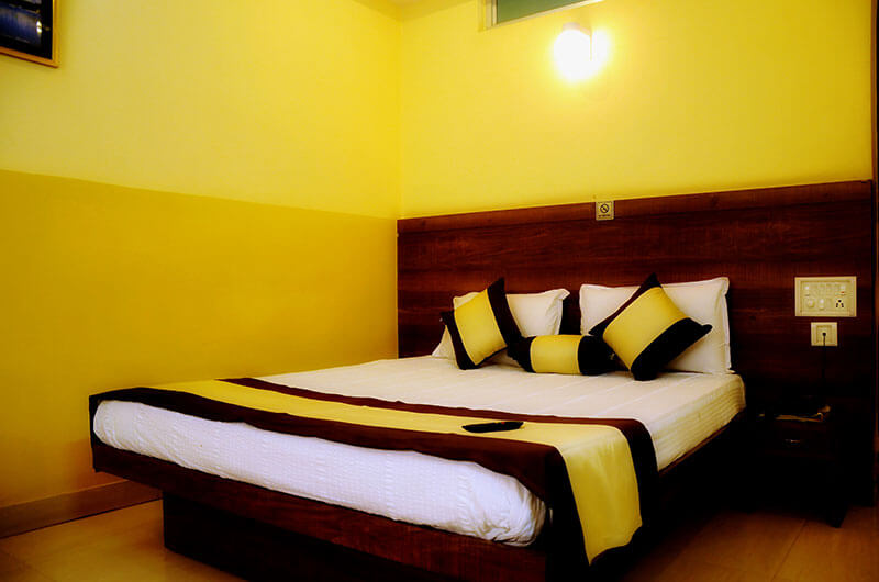 Deluxe AC Room at Suvarna Residency, Mysore