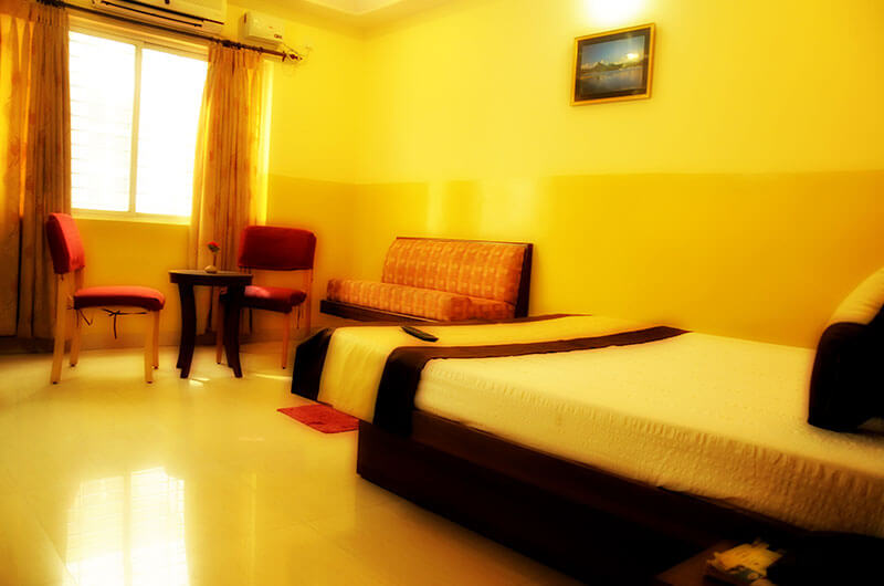 Suvarna Residency-Deluxe AC Room1