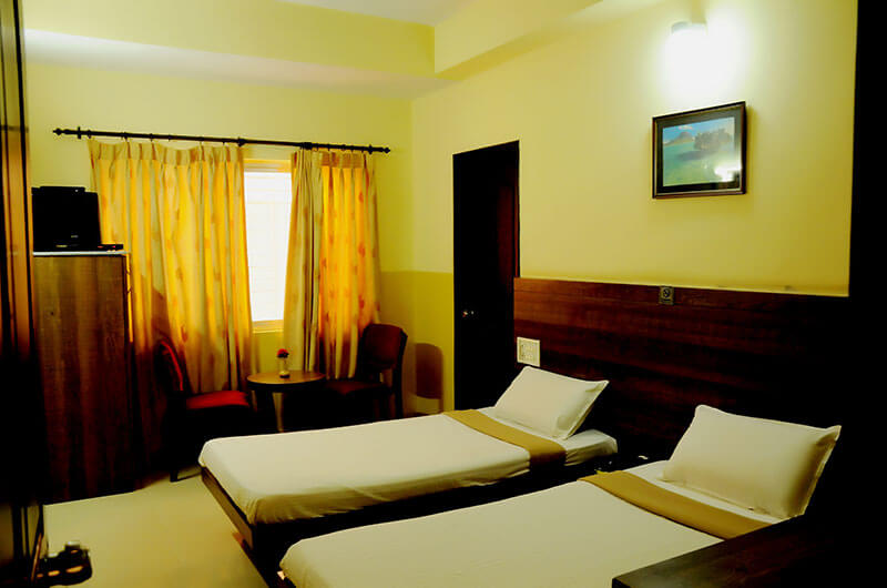 Suvarna Residency-Deluxe AC Room2