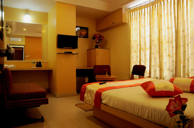 Suvarna Residency-Deluxe AC Room8