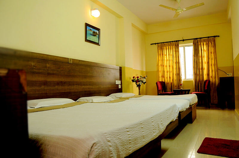 Book Family AC Room at Suvarna Residency, Mysore